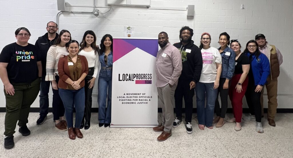 Group photo of the LPTX Organizing Committee meeting in Houston, TX in December 2023. Members gather around a LPTX sign.